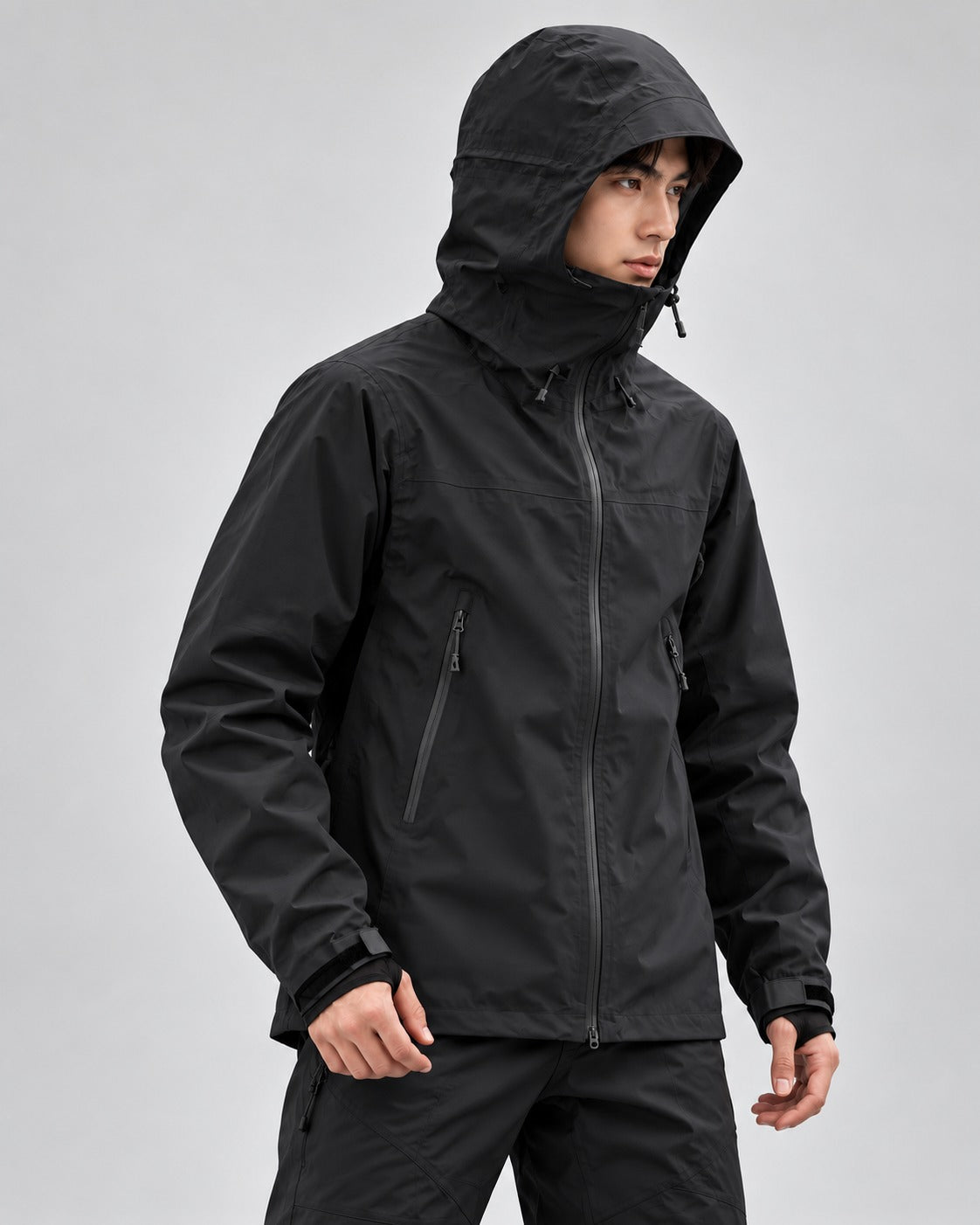 Black | CAMEL membrane jacket with the storm hood up