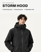 Black | Storm hood, drawstring hem and adjustable cuffs